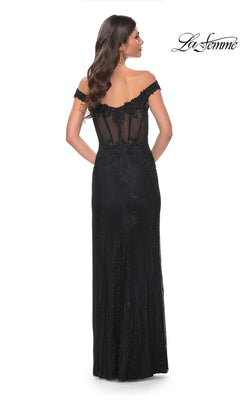 A woman faces away from the camera in the La Femme Off-Shoulder Long Corset Prom Dress 32116, featuring a sheer fitted corset bodice and lace back. The "La Femme" logo appears in the top right corner.