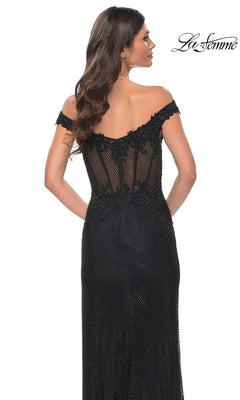 A woman with long brown hair models the La Femme Off-Shoulder Long Corset Prom Dress 32116, showcasing a black sequined gown with a sheer corset bodice and lace back. The "La Femme" logo appears in the top right corner.