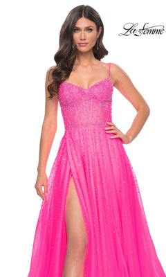 A woman wears the La Femme Beaded Long A-Line Prom Dress 32146 in bright pink, featuring beaded details, spaghetti straps, and a high slit. The La Femme logo appears in the top right corner.