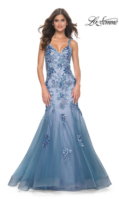A woman in the La Femme Slate Blue Long Mermaid Prom Dress 32192.