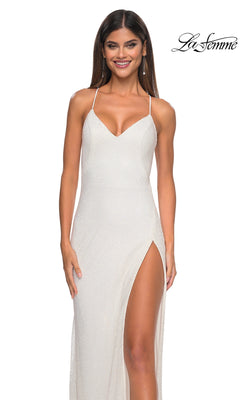 Smiling woman poses against a plain background with the "La Femme" logo, wearing the La Femme Embellished Long Fishnet Prom Dress 32203, featuring thin straps and a thigh-high slit.