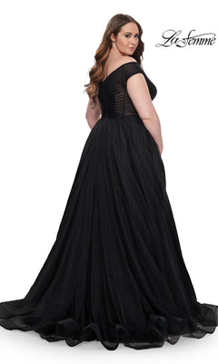 A woman with long brown hair models the La Femme Plus-Size Long A-Line Prom Dress 32204, floor-length and off-the-shoulder, as she looks over her shoulder against a plain white background with "La Femme" in the top right corner.