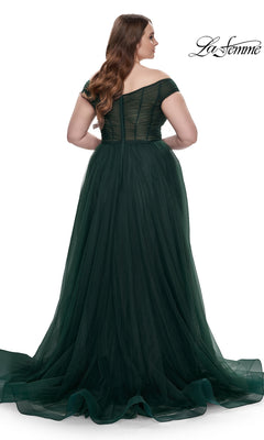 A woman is shown from the back in the La Femme Plus-Size Long A-Line Prom Dress 32204, a dark green off-the-shoulder designer gown with a fitted bodice and flowing tulle skirt, set against a white background for an elegant effect.