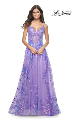 A woman models the La Femme Sequin-Print Long A-Line Prom Dress 32223 with spaghetti straps and floral embroidery against a white background. The La Femme logo appears in the top right corner.