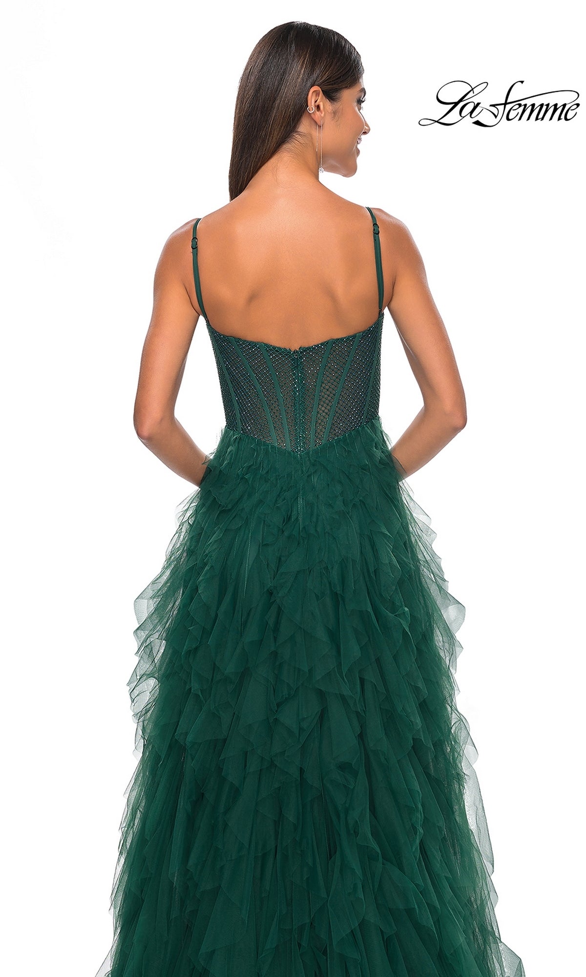 Woman wearing the La Femme Sheer-Waist Long Ruffled Prom Dress 32233 in dark green, shown from the back. It features thin straps, a fitted semi-sheer bodice, and a flowing ruffled skirt for an elegant look.