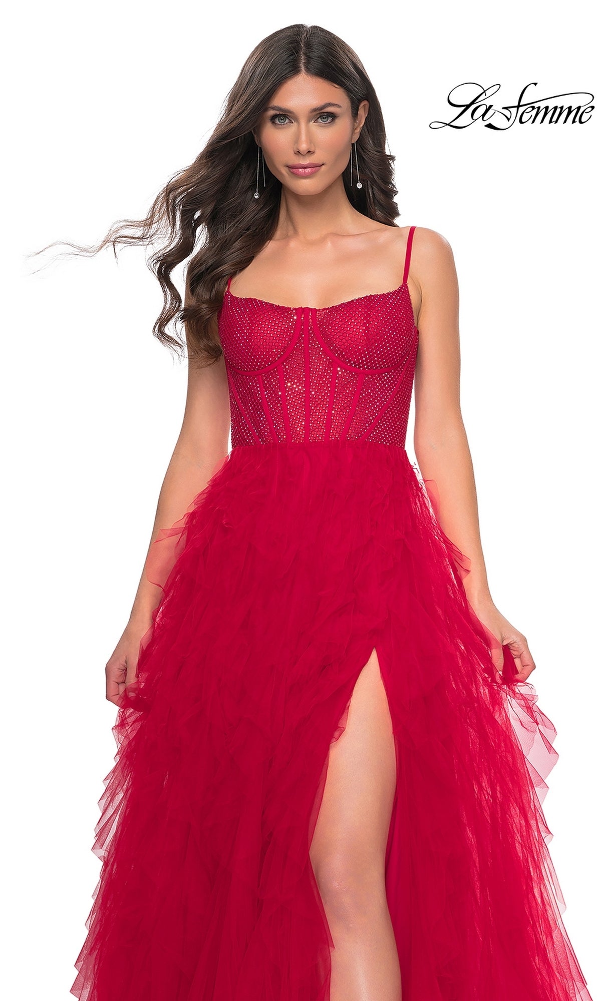 A woman wearing the La Femme Sheer-Waist Long Ruffled Prom Dress 32233 poses against a white background.