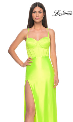 A woman models the La Femme Bright Neon Long Prom Dress 32262, featuring a corset-style bodice, thin straps, and a high slit, against a white background. The "La Femme" logo is visible in the top right corner.