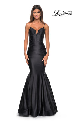 A woman wears the La Femme Long Corset Mermaid Prom Dress 32269, a fitted, sleeveless black gown with thin straps, standing against a white background. The "La Femme" logo is shown in the top right corner.