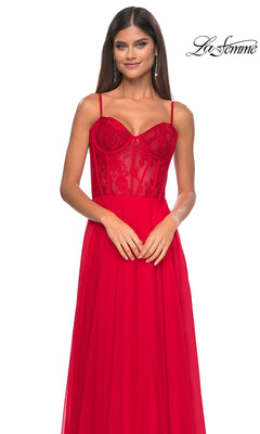 A woman models the La Femme Long Chiffon Sweetheart Prom Dress 32276 in red, featuring a floral-lace bodice and spaghetti straps, standing against a white background with the "La Femme" logo in the top right corner.