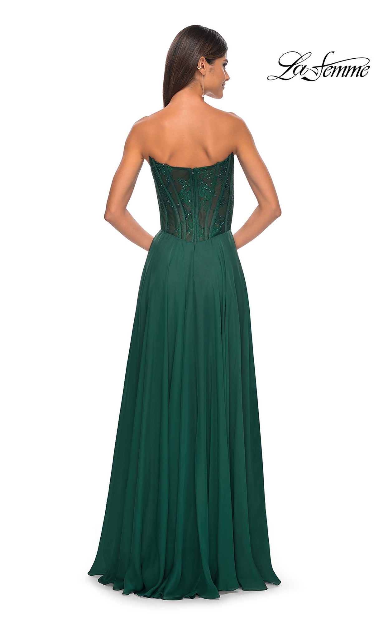 A woman is seen from the back wearing the La Femme Lace-Bodice Long A-Line Prom Dress 32311 in dark green, featuring a strapless fitted beaded lace bodice and a flowing skirt. The La Femme logo appears in the top right corner.