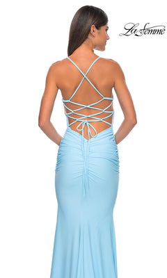 Woman in a light blue La Femme Embellished-Bodice Long Prom Dress 32320, showcasing an embellished bodice, open back with crisscross lace-up straps, and ruched skirt detailing.