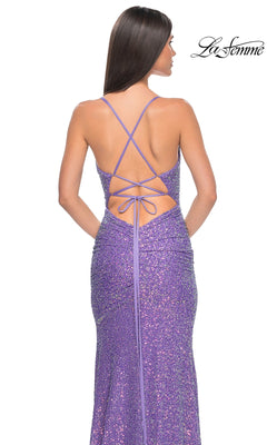 A woman is shown from behind wearing the La Femme Lace-Up Long Sequin Prom Dress 32330 in sparkly purple, featuring an open back and crisscross lace-up straps. The La Femme logo appears in the top right corner.