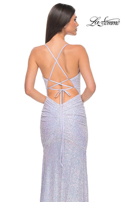 Woman shown from behind wearing the La Femme Tight Long Sequin Prom Dress 32331 in sparkly light lavender, featuring crisscross straps and ruched detailing.