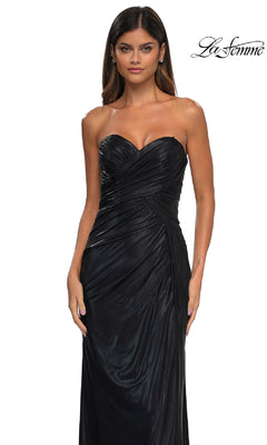 Woman wearing the La Femme 32375 strapless long metallic prom dress with a ruched design and sweetheart neckline, stands against a white background featuring the "La Femme" logo in the top right corner.