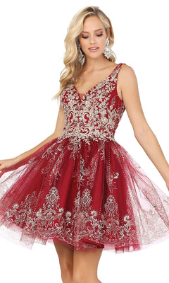 A woman wears the Silver-Beaded Short Babydoll Hoco Dress 3237—a sleeveless, flared tulle skirt dress featuring intricate silver beading.