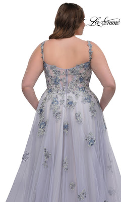 Woman wearing the La Femme 32412 long plus-size prom ball gown, featuring a sleeveless design, blue floral lace embroidery, and an elegant corset bodice, shown from the back against a white background.