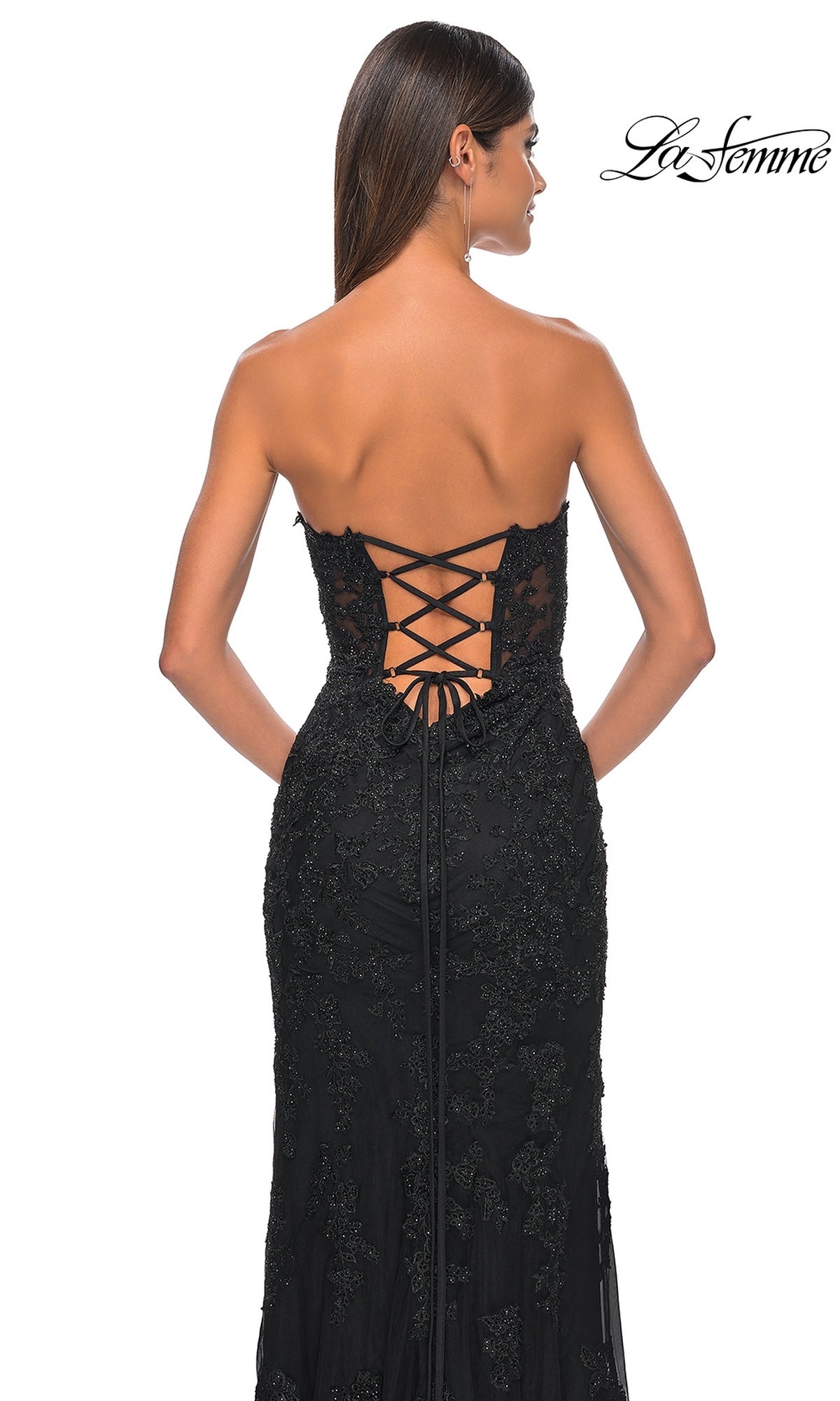 A woman wears the Beaded-Lace Long Prom Dress: La Femme 32437, featuring a strapless sweetheart neckline, beaded details, and lace-up back, standing against a plain white background with the La Femme logo in the top right corner.
