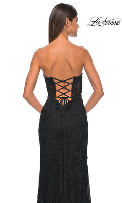 A woman wears the Beaded-Lace Long Prom Dress: La Femme 32437, featuring a strapless sweetheart neckline, beaded details, and lace-up back, standing against a plain white background with the La Femme logo in the top right corner.