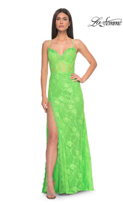 A woman in heels wears the La Femme Bright Long Lace Prom Dress 32441, featuring neon lace, spaghetti straps, a sheer corset bodice, and a high slit. She stands against a white background with the La Femme logo in the corner.