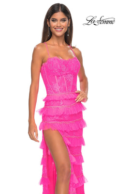 A woman wears the Ruffled Long Beaded-Lace Prom Dress: La Femme 32442—a bright pink gown with ruffles, spaghetti straps, beaded-lace details, and a high slit. The La Femme 32442 logo appears in the top right corner.