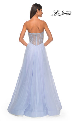A woman wears the Strapless Long A-Line Prom Dress: La Femme 32445 in light blue with a sheer corset-style bodice, standing facing away. The La Femme logo is displayed in the top right corner.