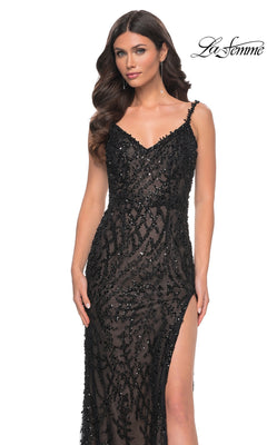 A woman models the La Femme 32450: a sleeveless, long black beaded prom dress with a high slit, shown against a white background. "La Femme" appears in the top right corner.