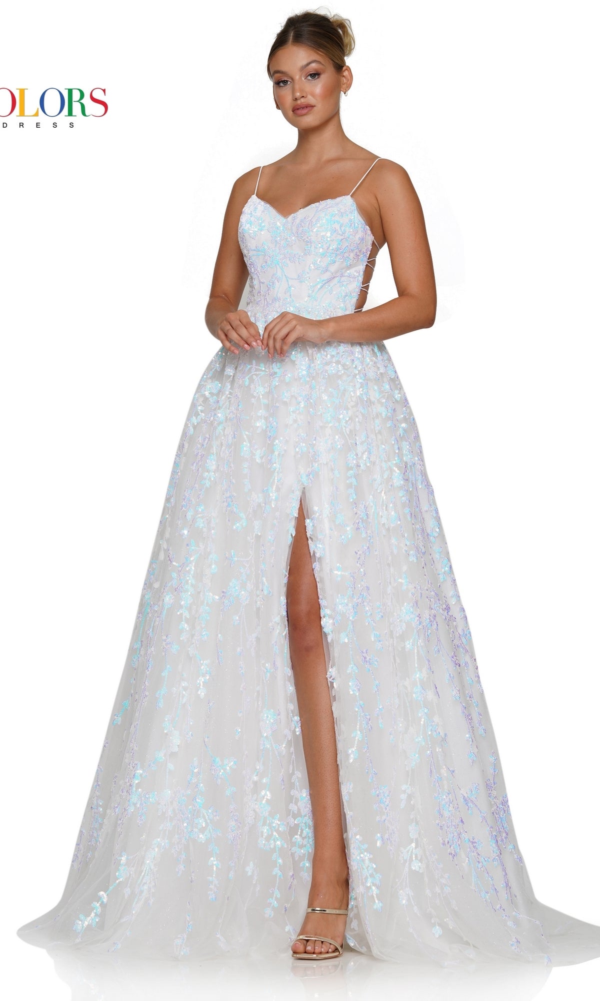 A woman models the Sequin-Embroidered Backless Long Prom Dress 3247, featuring thin straps, floral sequin embroidery, and a high front slit, as she stands against a plain white background.