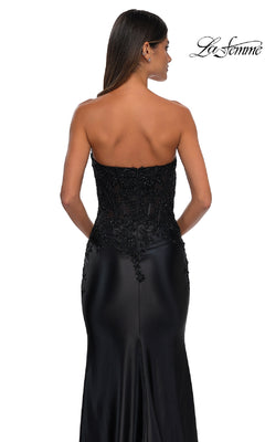 A woman models the La Femme 32582, a tight strapless long prom dress with a beaded bodice and embroidered details, photographed from the back on a white background. The "La Femme" logo is in the top right corner.