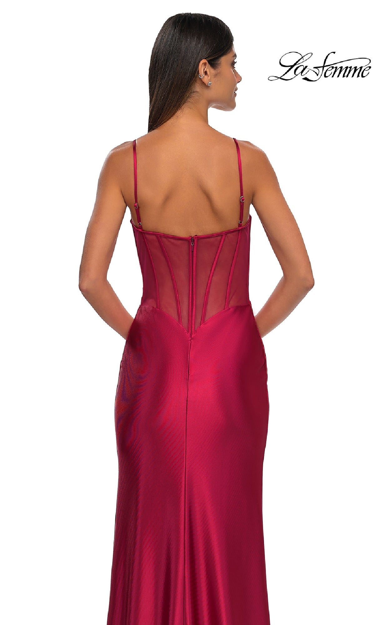 Woman in a La Femme 32640 Sheer-Back Simple Long Prom Dress, in deep red satin with spaghetti straps, photographed from behind against a white background.