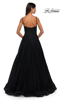 A woman is shown from the back wearing the La Femme 32646 long prom ball gown with pockets, featuring a fitted, embellished bodice and a flowing skirt. The La Femme logo appears in the top right corner.