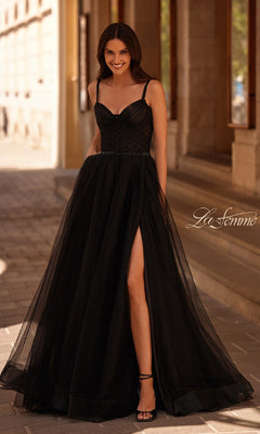 A woman in a black Beaded-Waist Long Prom Ball Gown: La Femme 32956 featuring a flattering corset bodice.