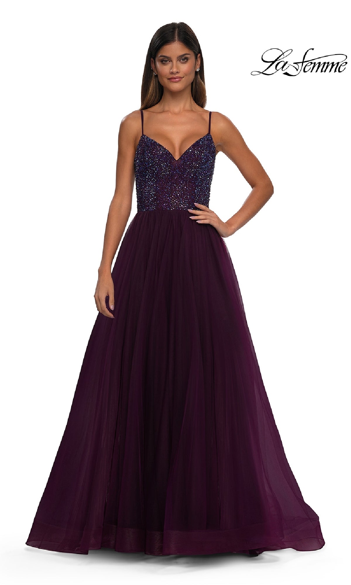 A woman models the La Femme 32668 Beaded-Bodice Long Prom Ball Gown, showcasing its sparkling V-neck bodice and flowing chiffon skirt against a white background.