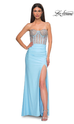 A woman models the Strapless Long Corset Prom Dress: La Femme 32669, featuring a beaded corset and high side slit, against a plain white background with the "La Femme" logo in the top right corner.