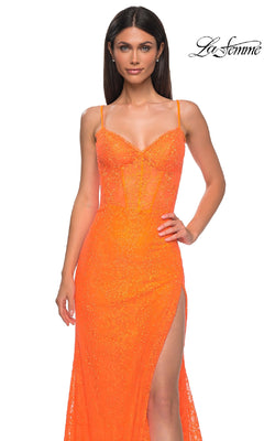 A woman wears the Beaded-Lace Long Corset Prom Dress by La Femme (style 32671), featuring bright orange color, sleeveless design, spaghetti straps, sweetheart neckline, side slit, and sheer bodice. La Femme logo appears top right.