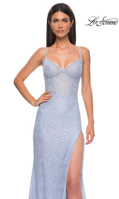 Woman wearing the Beaded-Lace Long Corset Prom Dress: La Femme 32671—a light blue gown with thin straps, sweetheart neckline, sheer corset bodice, and high slit. "La Femme" brand name appears in the top right corner.