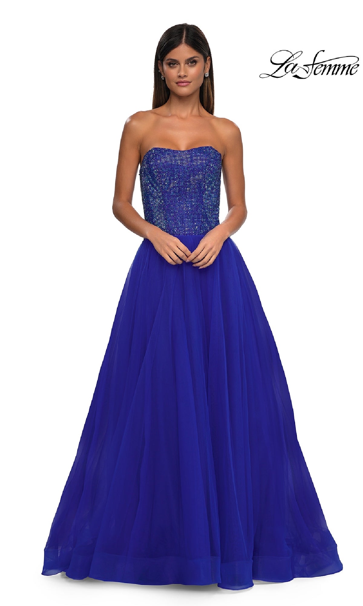 A woman models the La Femme 32690 Strapless Long Prom Ball Gown with a sweetheart bodice, sequin details, and tulle skirt against a white background. The La Femme logo appears in the top right corner.