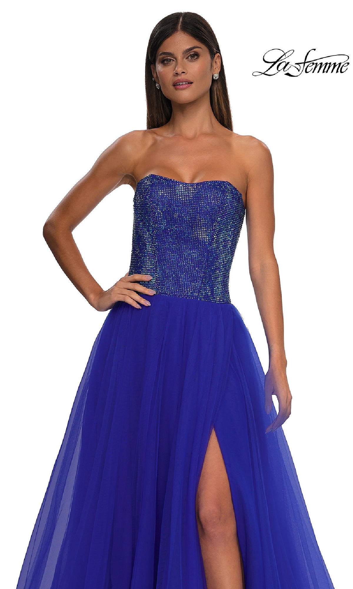 A woman models the Strapless Long Prom Ball Gown La Femme 32690 in royal blue, featuring a sweetheart beaded bodice, sheer tulle skirt with thigh-high slit. The La Femme logo appears in the top right corner.