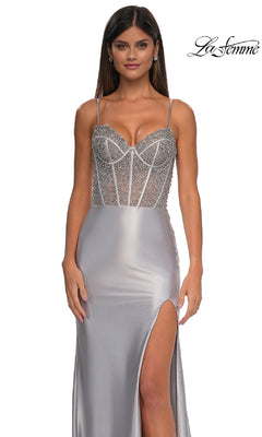 A woman wears the La Femme 32691 Long Satin Corset Prom Dress, featuring a beaded bodice, spaghetti straps, and a high slit, standing against a white background. The La Femme logo is visible in the top right corner.