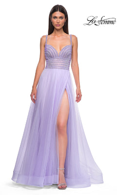 A woman models the La Femme 32714 Rhinestone-Bodice Prom Ball Gown, featuring a long tulle skirt, thin straps, and high slit, against a white background with the La Femme logo in the corner.
