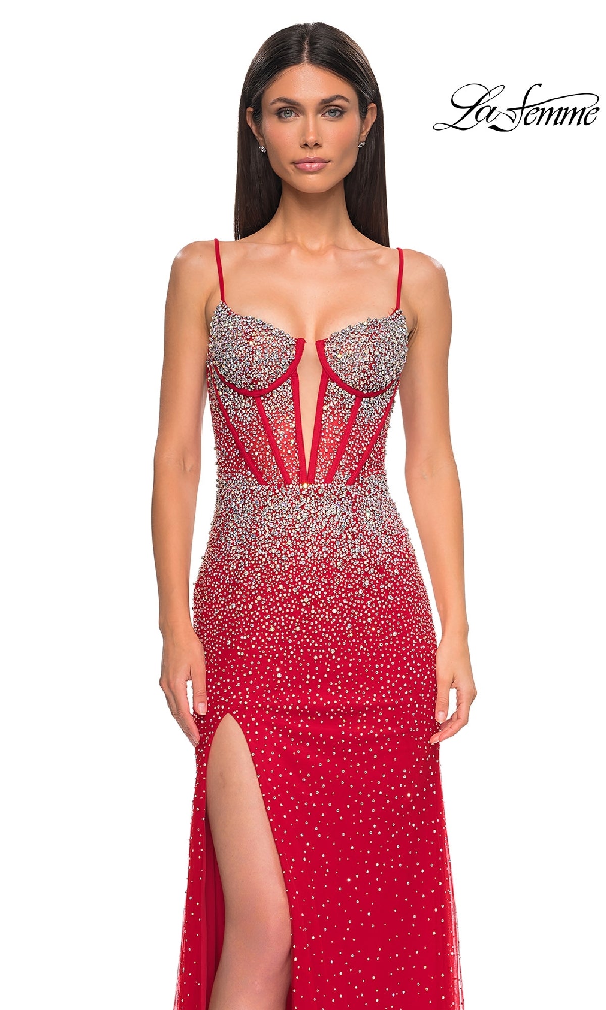 A woman wears the La Femme 32717 long prom dress, featuring a fitted red design with rhinestones, spaghetti straps, a corset bodice, and thigh-high slit. The La Femme logo is in the top right corner.