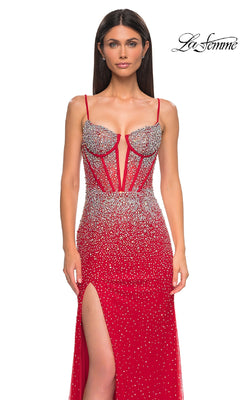A woman wears the La Femme 32717 long prom dress, featuring a fitted red design with rhinestones, spaghetti straps, a corset bodice, and thigh-high slit. The La Femme logo is in the top right corner.