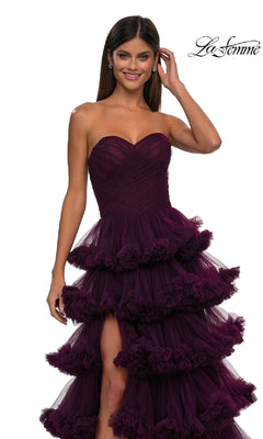 A woman in the striking Strapless Ruffled Prom Ball Gown, La Femme 32721, makes a statement.