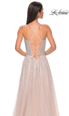 A woman models the La Femme 32725 Lace-Up Beaded Long Prom Ball Gown, featuring a sleeveless beaded design, crisscross lace-up back, and flowing skirt. The La Femme logo is displayed in the top right corner.