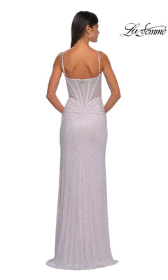 Woman shown from the back in a fitted, floor-length pale pink Classic Long Beaded Prom Dress: La Femme 32753 with thin straps, structured bodice, and subtle shimmer. The La Femme logo appears in the top right corner.