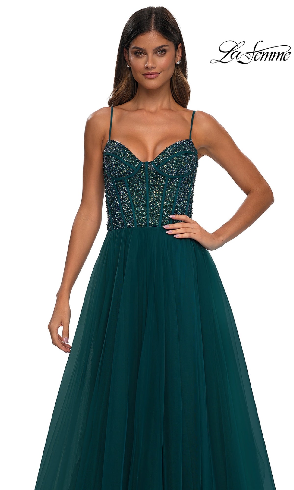 A woman wears the La Femme 32754 Beaded-Bodice Long Prom Dress, featuring a dark green fitted bodice with rhinestones and a tulle skirt, against a white background. The La Femme logo is displayed in the top right corner.