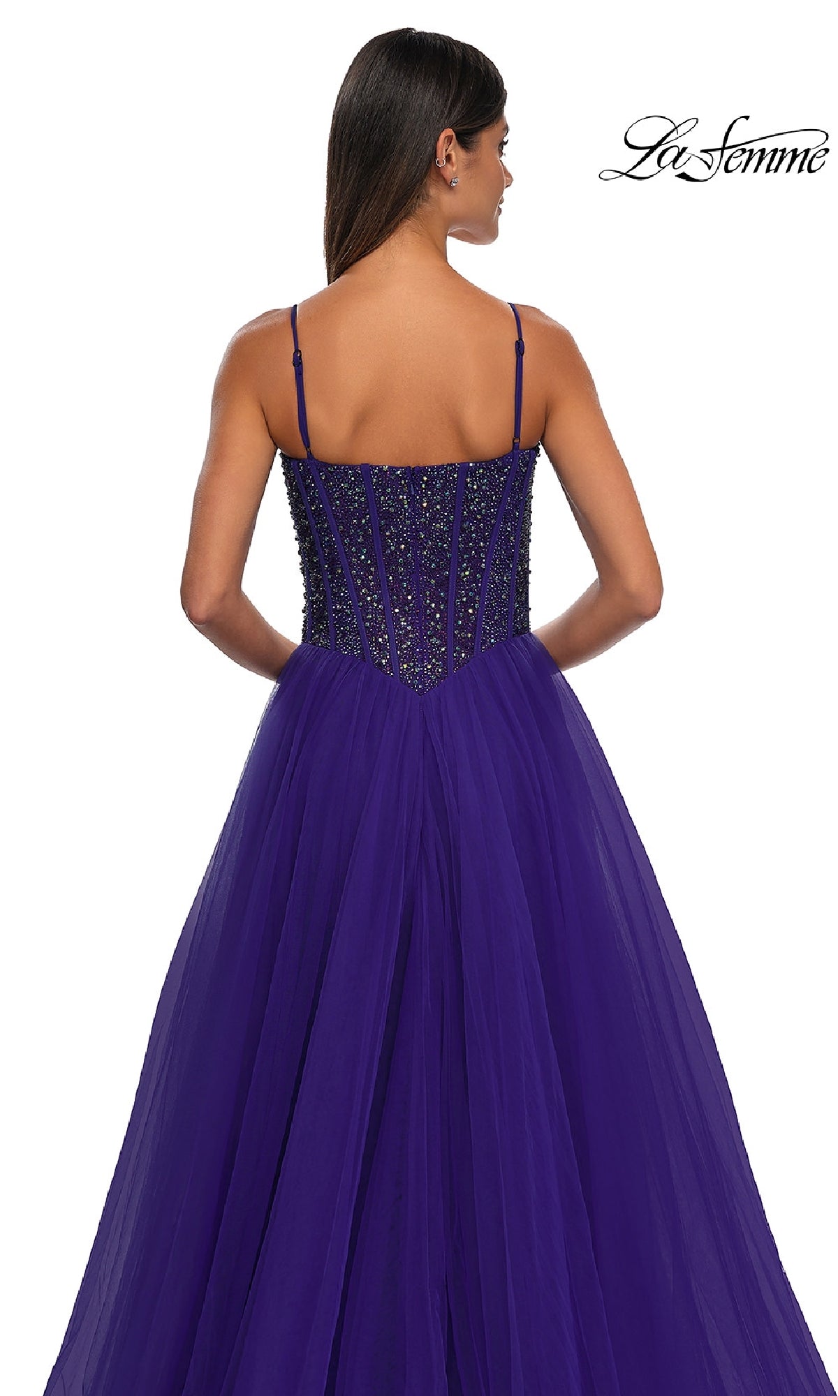 A woman models the Beaded-Bodice Long Prom Dress: La Femme 32754 in deep purple, featuring thin straps and a fitted beaded bodice. Shown from the back on a white background with the La Femme logo displayed in the corner.
