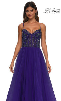 Woman wearing a Beaded-Bodice Long Prom Dress: La Femme 32754 in deep purple, featuring rhinestone embellishments, sheer tulle skirt, thin straps, and structured fit; "La Femme" logo appears in the top right corner.