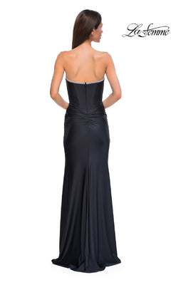 A woman faces away, wearing the Bead-Trimmed Strapless Prom Gown La Femme 32756 with slight ruching at the lower back. The 'La Femme' logo is displayed in the top right corner.