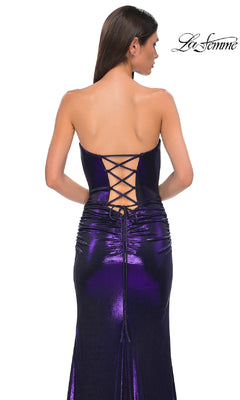 A woman models the La Femme 32757, a strapless metallic long prom dress with a sweetheart neckline and lace-up back, standing against a white background. The La Femme logo appears in the top right corner.