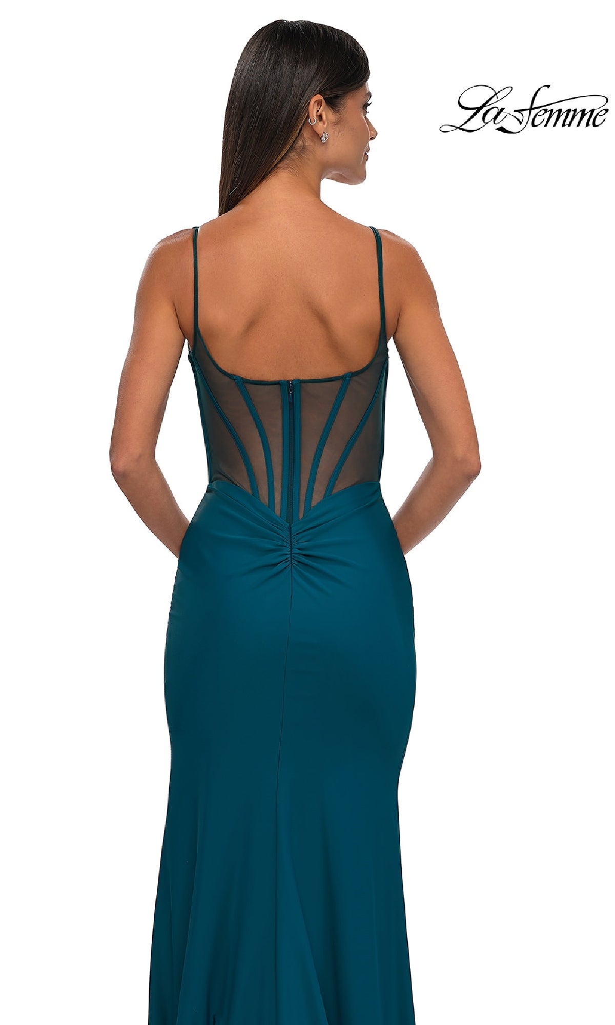 A woman is seen from behind in the La Femme 32763 Plunging V-Neck Long Prom Dress, featuring a teal color, sleeveless style, sheer mesh back, and zipper closure. The La Femme logo is visible in the top right corner.